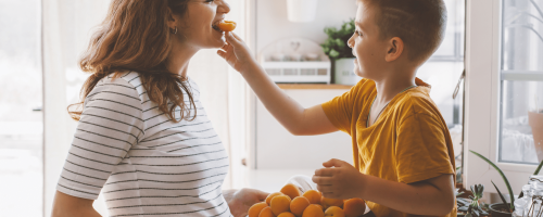 mother-son-eating-apricots-2000x15004-1.png